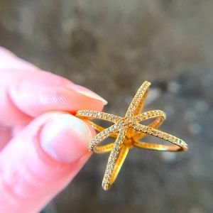 Gold plated crossover ring with CZ